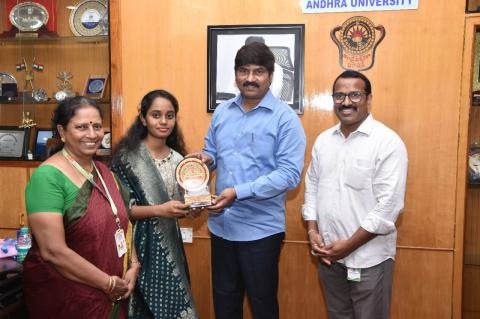 Receiving the University Topper award at Andhra University